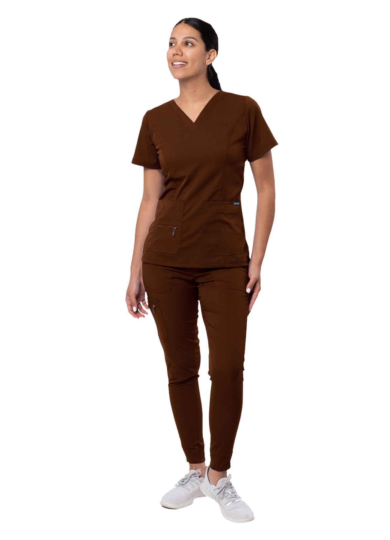 The Adar Pro Flawless Plus Scrub Set for women includes an Elevated V-Neck Top and Jogger Scrub Pants. S-XL