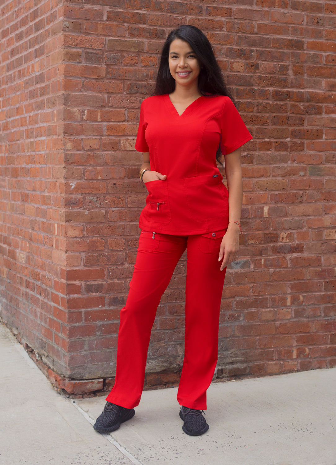 The Adar Pro Breakthrough Plus Scrub Set tailored for women consists of an Enhanced V-Neck Top and Multi Pocket Pants. S-XL